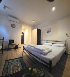 Ένα ή περισσότερα κρεβάτια σε δωμάτιο στο Byzanthin rooms +48 φωτογραφίες