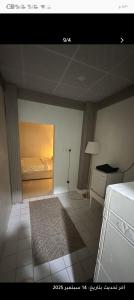 Postel nebo postele na pokoji v ubytování استوديو بدخول ذاتي بسيط وأنيق مدينة الخبر