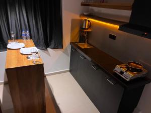 Kuchyň nebo kuchyňský kout v ubytování Iyra Homes - Hikkaduwa + 19 fotografií