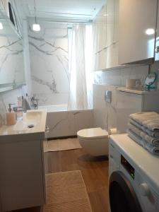 Kuchyň nebo kuchyňský kout v ubytování Apartament Prowansalski