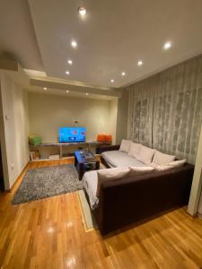 TV a/nebo společenská místnost v ubytování apartman the one - free parking