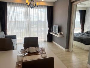 Ένα ή περισσότερα κρεβάτια σε δωμάτιο στο The patio บางแสน