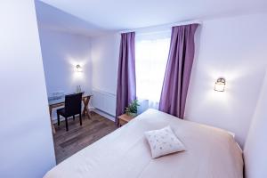 Postel nebo postele na pokoji v ubytování Gasthaus Alte Post