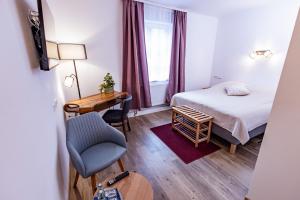 Postel nebo postele na pokoji v ubytování Gasthaus Alte Post