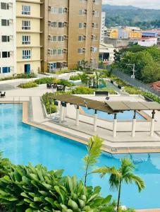 Πισίνα στο ή κοντά στο Skyes Cozy & Warm Studio-Avida Towers Aspira