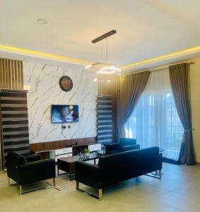 Μια τηλεόραση ή/και κέντρο ψυχαγωγίας στο Lanosa Stay, Wuye