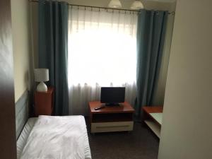 Grodzka B&Bにあるベッド