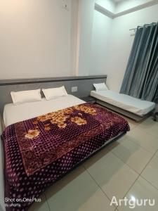 Φωτογραφία από το άλμπουμ του Hotel Madhuram 450 Mtr Ringus Railway STN σε Rīngas