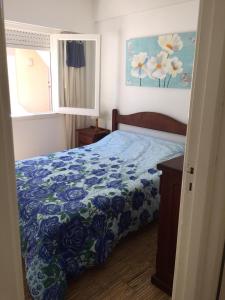 Ένα ή περισσότερα κρεβάτια σε δωμάτιο στο Piemonte