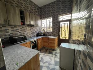 Η κουζίνα ή μικρή κουζίνα στο ES Apartments