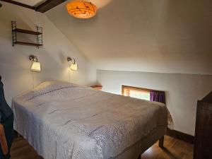 Postel nebo postele na pokoji v ubytování Östgården