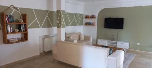 Μια τηλεόραση ή/και κέντρο ψυχαγωγίας στο Perle Du Banlieue Nord