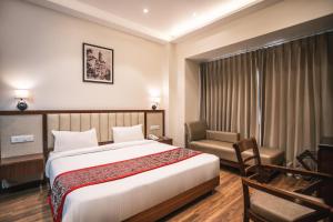 Ένα ή περισσότερα κρεβάτια σε δωμάτιο στο Hotel The Gross Infinity Near Delhi Airport