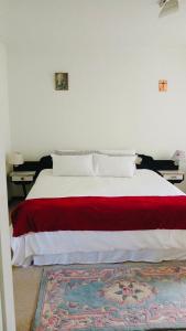 Ένα ή περισσότερα κρεβάτια σε δωμάτιο στο EL Golfview