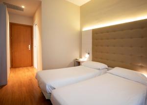 Postel nebo postele na pokoji v ubytování Primavera