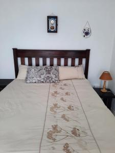 Postel nebo postele na pokoji v ubytování Sea shells self catering + 9 fotografií