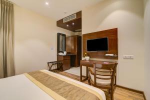 Μια τηλεόραση ή/και κέντρο ψυχαγωγίας στο Hotel The Gross Infinity Near Delhi Airport +13 φωτογραφίες