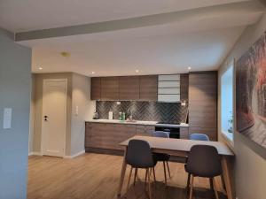 Køkken eller tekøkken på Sentral leilighet