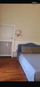 Postel nebo postele na pokoji v ubytování Brera home suite + 3 fotografie