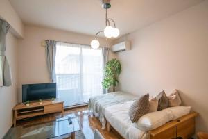 Μια τηλεόραση ή/και κέντρο ψυχαγωγίας στο Sunny Harbor Kurihama 201 in Kurihama station