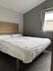 Ένα ή περισσότερα κρεβάτια σε δωμάτιο στο Jurrasic Discovery