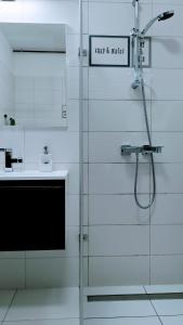 Koupelna v ubytování Pe-Ki Lux Apartman Székesfehérvár + 5 fotografií