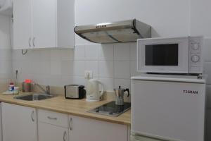 Kuchyň nebo kuchyňský kout v ubytování Hotel Las Palmas Urban Center