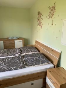 Ένα ή περισσότερα κρεβάτια σε δωμάτιο στο Janas Ferienwohnung