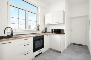 Η κουζίνα ή μικρή κουζίνα στο SPECTRA Rooms