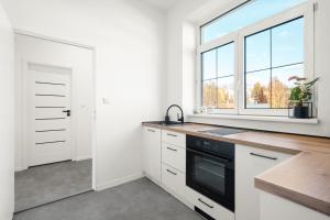 Η κουζίνα ή μικρή κουζίνα στο SPECTRA Rooms +6 φωτογραφίες