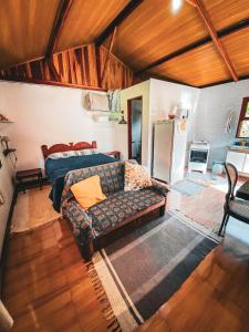 Posezení v ubytování Chalés Camping Vale Das Cachoeiras Visconde de Mauá