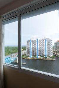 Swimmingpoolen hos eller tæt på Luxury Waterfront Condo Hilton Hotel Amenities Beach Pool Jacuzzi Jetskis Gym