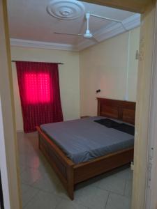 Postel nebo postele na pokoji v ubytování SALY - Diambar