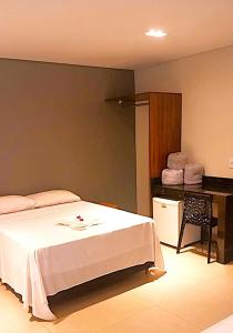 Postel nebo postele na pokoji v ubytování Bravo City Hotel Dourados