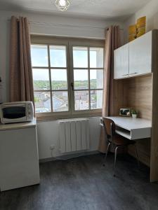 Kuchyň nebo kuchyňský kout v ubytování Petit studio rénové en centre ville - Apt8 + 8 fotografií