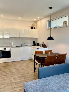 Η κουζίνα ή μικρή κουζίνα στο Moderne Wohnung in Heskem bei Marburg (Lahn)