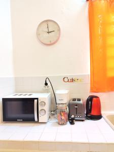 Η κουζίνα ή μικρή κουζίνα στο Miracle des Caraibes +11 φωτογραφίες