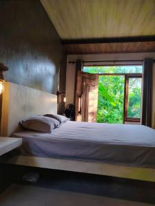 Postel nebo postele na pokoji v ubytování Dothalu Villa