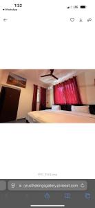 uma imagem de um quarto com uma cama em RAGANT Hotel em Cape Coast