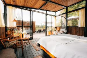 Ένα ή περισσότερα κρεβάτια σε δωμάτιο στο Cabaña Ocaso Forest El Retiro +24 φωτογραφίες