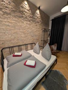 Postel nebo postele na pokoji v ubytování K&S Apartments