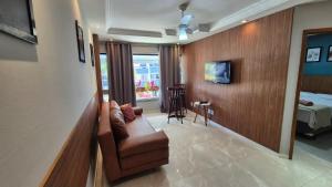 TV a/nebo společenská místnost v ubytování FLAT Jardim de Alah - Frente Praia