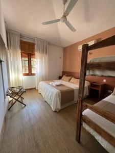 Ένα ή περισσότερα κρεβάτια σε δωμάτιο στο Casa Piedra Hotel