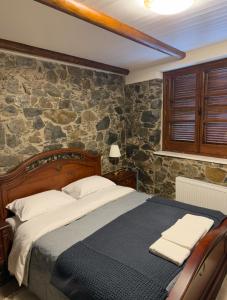 Ένα ή περισσότερα κρεβάτια σε δωμάτιο στο To Pentrino 1