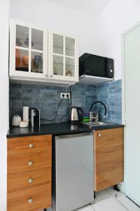 Η κουζίνα ή μικρή κουζίνα στο Green Sea Studio