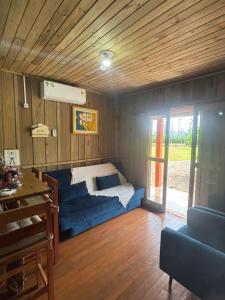 Habitación con cama en el medio de una habitación en Pousada dos Sonhos - Casa Goiabeira, en Timbe do Sul 11 fotos más