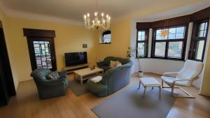 Μια τηλεόραση ή/και κέντρο ψυχαγωγίας στο Ferienwohnung im Musikerviertel