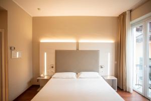 Postel nebo postele na pokoji v ubytování Primavera