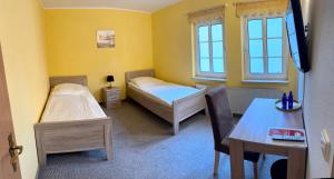 Postel nebo postele na pokoji v ubytování Hotel La-Pergola