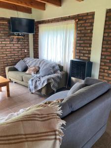 Et opholdsområde på Cabañas La Ufu